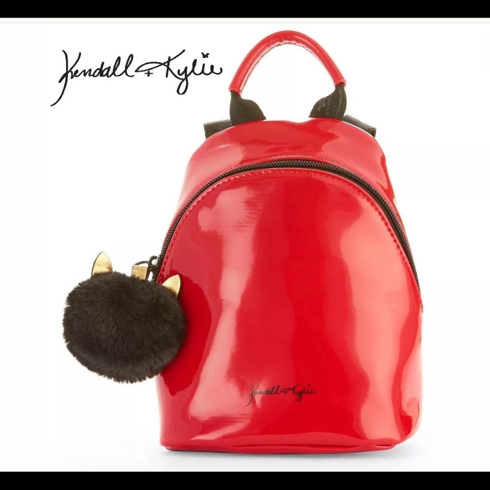 Kendall Kylie Red Mini Backpack with Pom Pom.